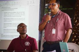 14.	David James, legal advisor at the Ministry of Indigenous Affairs of Guyana, and Helmut Gezius, Direction Coordinator of the Sociology Course at Anton de Kom University of Suriname, during the panel discussion on community involvement and Access and Benefit Sharing in Protected Areas Management  © Arnaud Anselin PAG 